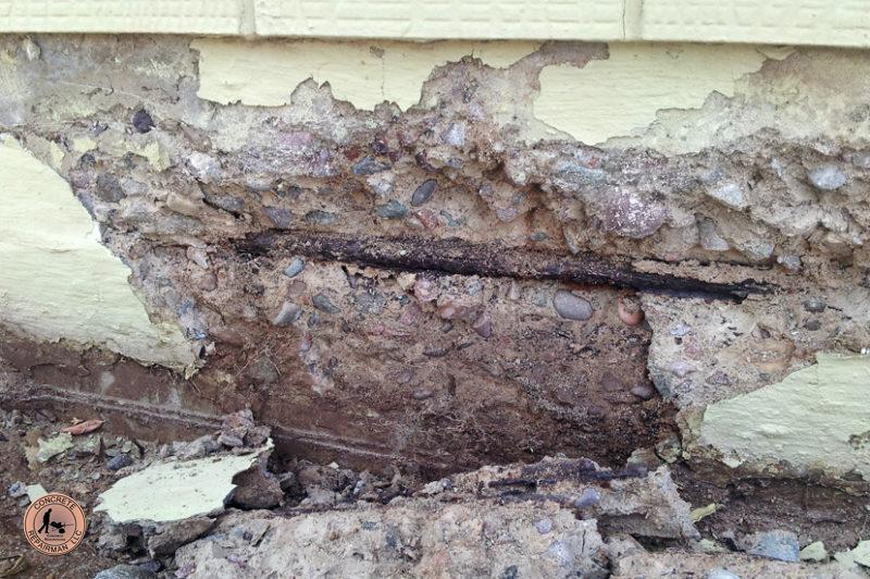 Exposed Rebar and Failing Concrete on the Home's Foundation