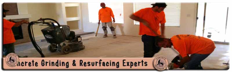 Concrete Repairman providing concrete floor grinding to level an uneven slab and prepare it for coating, call now to schedule your floor grinding service.