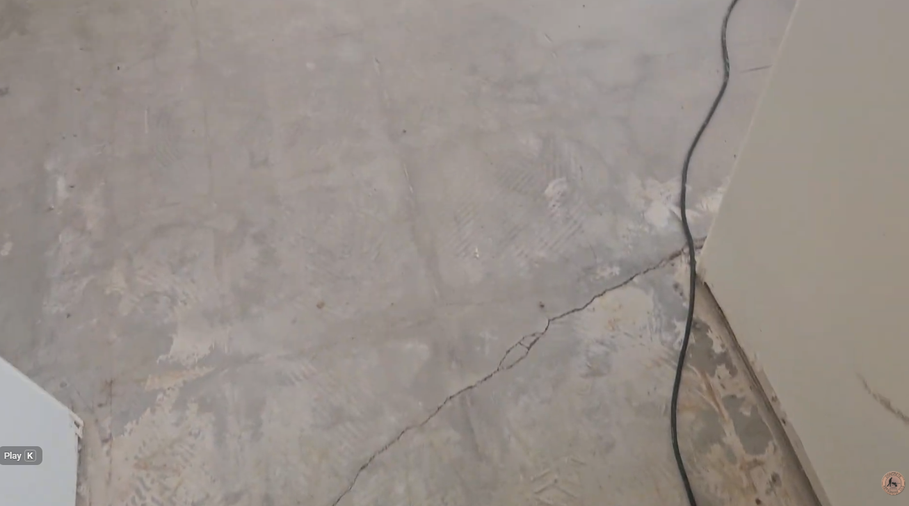 Minor floor cracks leading to major foundation damage with warning signs highlighted. Call Concrete Repairman LLC at (480) 725-7614 for expert foundation inspection and repair solutions today.