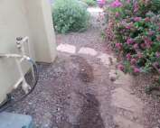 Foundation puddles and water damage in a home. Call Concrete Repairman at (480) 725-7614 for expert foundation inspection and repair solutions.