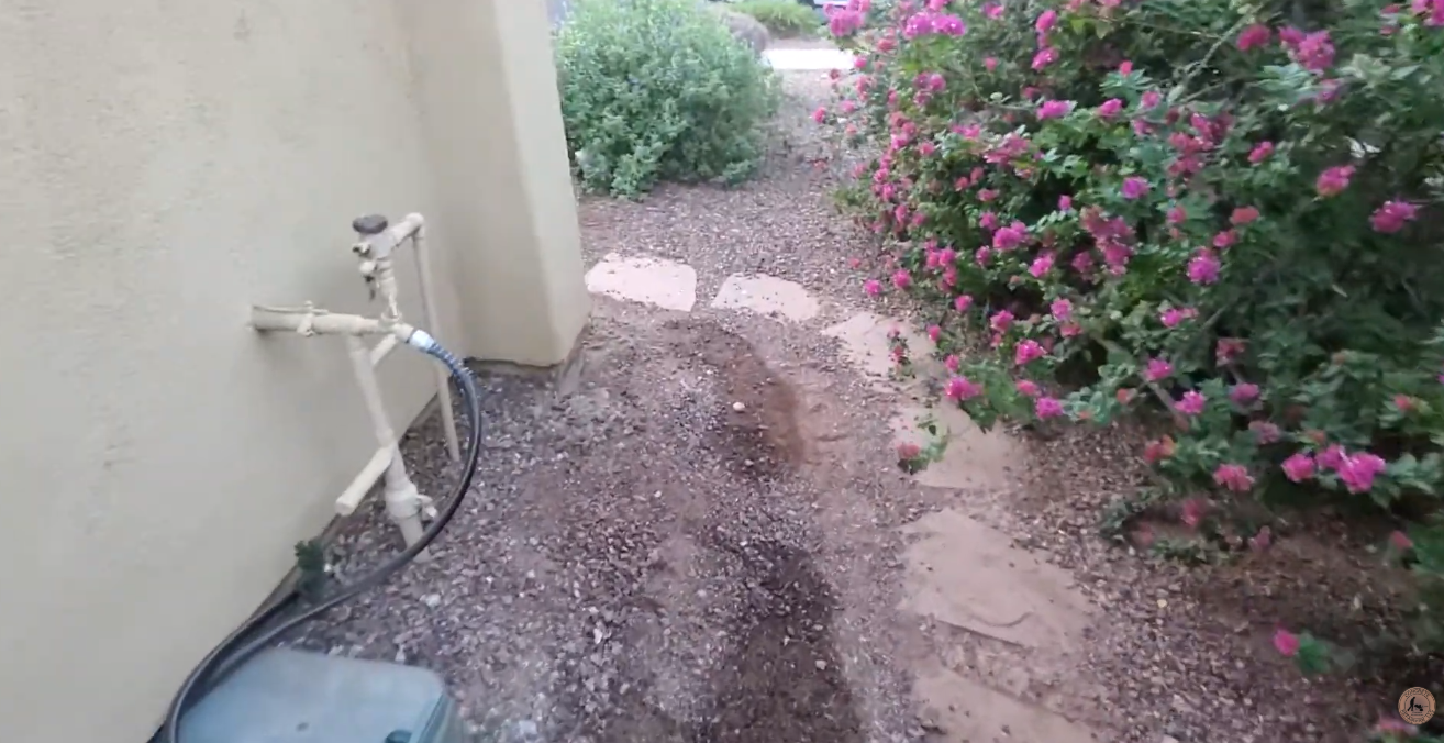 Foundation puddles and water damage in a home. Call Concrete Repairman at (480) 725-7614 for expert foundation inspection and repair solutions.