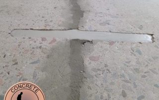 Concrete Crack Stitching for Foundation Wall Repair | Concrete Repairman Concrete Repairman performing Concrete Crack Stitching on a structural foundation wall crack